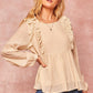 A Semi-sheer Striped Woven Top