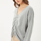 A V-neckline Drawstring Ruched Top
