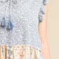Woven Prints Mixed And Sleeveless Flutter Top With Tassel Tie