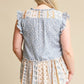 Woven Prints Mixed And Sleeveless Flutter Top With Tassel Tie