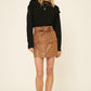 A Faux Leather Mini Skirt